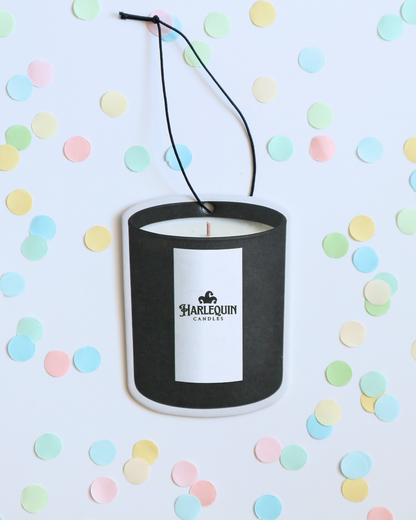 Black Harlequin Candles hanging car freshener, handmade for refreshing scent in your car or space.