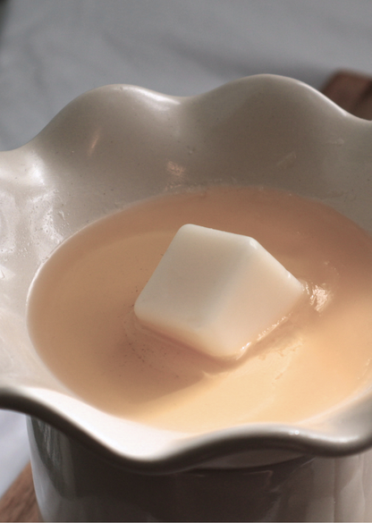 Soy wax melt melting in a ceramic wax burner