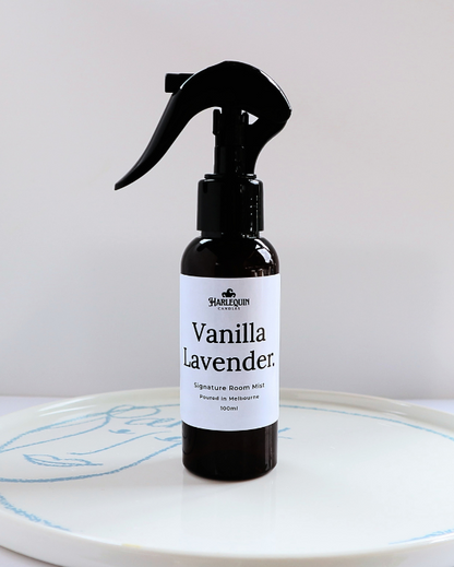 Harlequin Candles Vanilla Lavender 100ml signature room mist in a premium amber spray bottle on a minimalist white ceramic tray, hand-poured in Melbourne Australia.