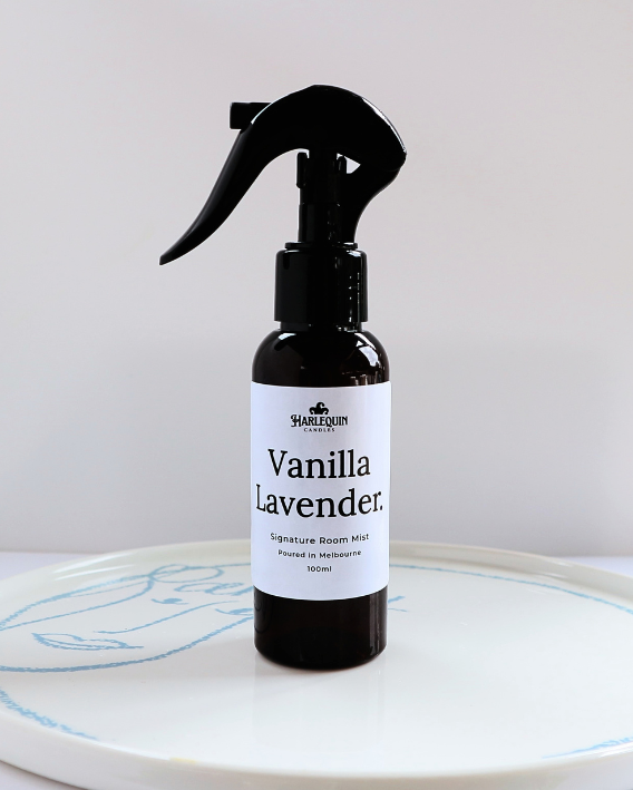 Harlequin Candles Vanilla Lavender 100ml signature room mist in a premium amber spray bottle on a minimalist white ceramic tray, hand-poured in Melbourne Australia.